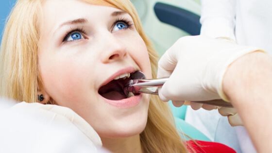 Woman relaxed during wisdom tooth extraction