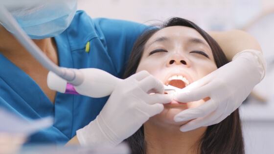 Dental patient receiving gum disease treatment