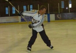 Doctor Devlin playing hockey