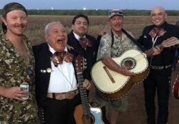 Doctor Tamborello performing with a mariachi group