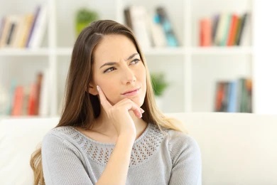 person wondering if they’re at risk for oral cancer